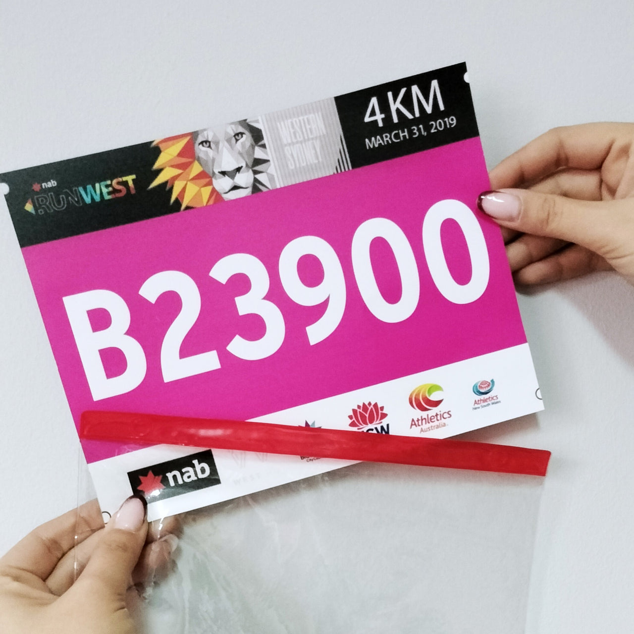 Race Bib Display — Clear Vinyl Protector Sheets (20 Pack, Red/Transparent)